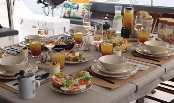 A breakfast table set on Purpose, with The Bahamas as backdrop.