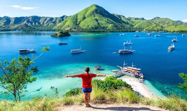 A charter guest overlooking a hidden Indonesian bay.